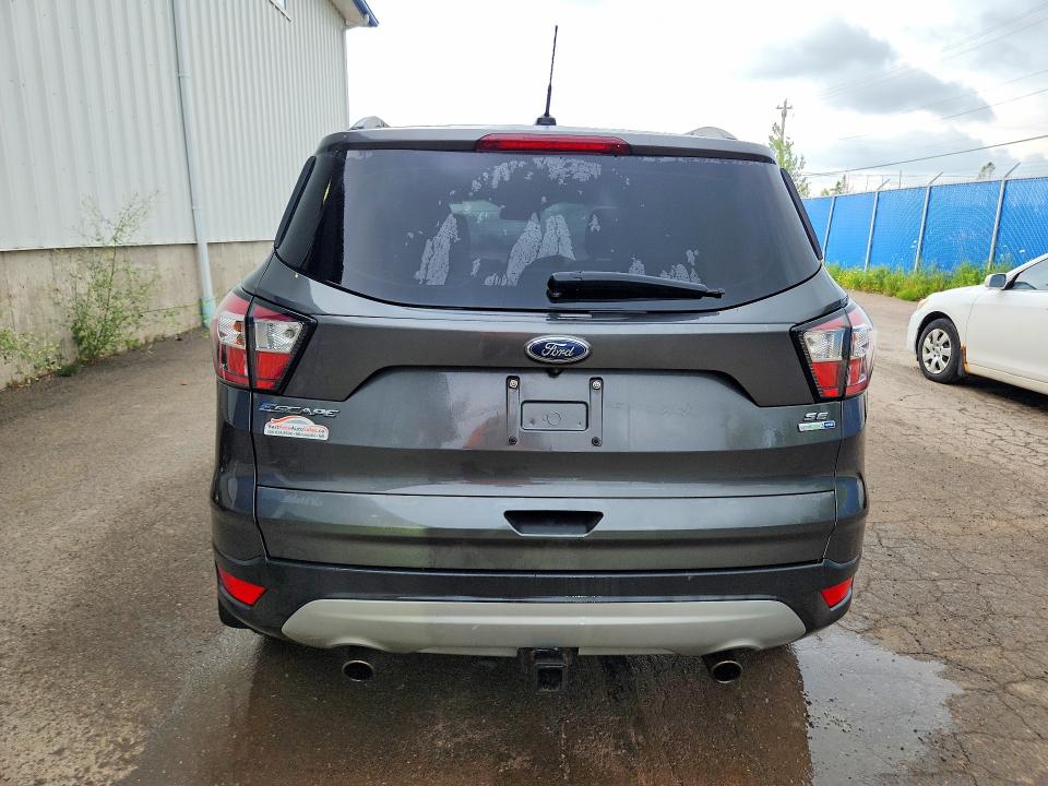 Photo 6 from auction – 2018 FORD ESCAPE with VIN 1FMCU9GD6JUC65557