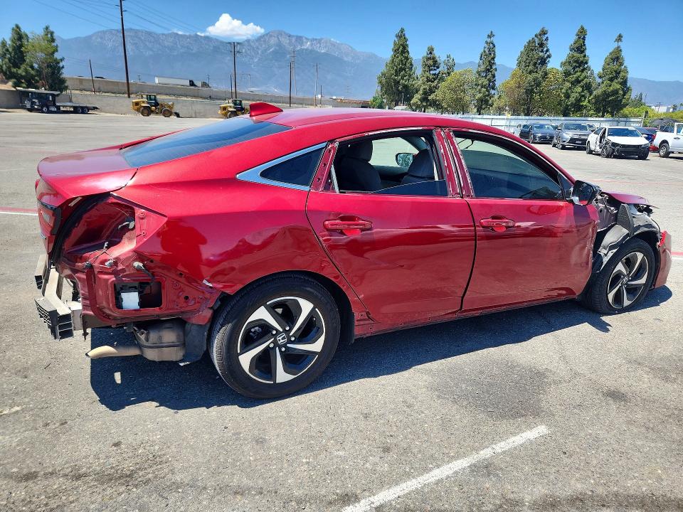 Photo 3 from auction – 2021 HONDA INSIGHT with VIN 19XZE4F55ME007199