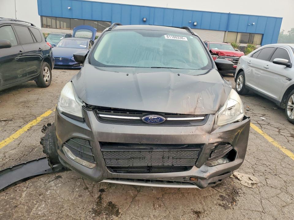 Снимка 5 от търг – 2016 FORD ESCAPE с VIN 1FMCU0GX6GUC40592
