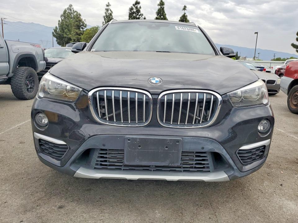 Photo 5 from auction – 2019 BMW X1 with VIN WBXHU7C54K3H46515