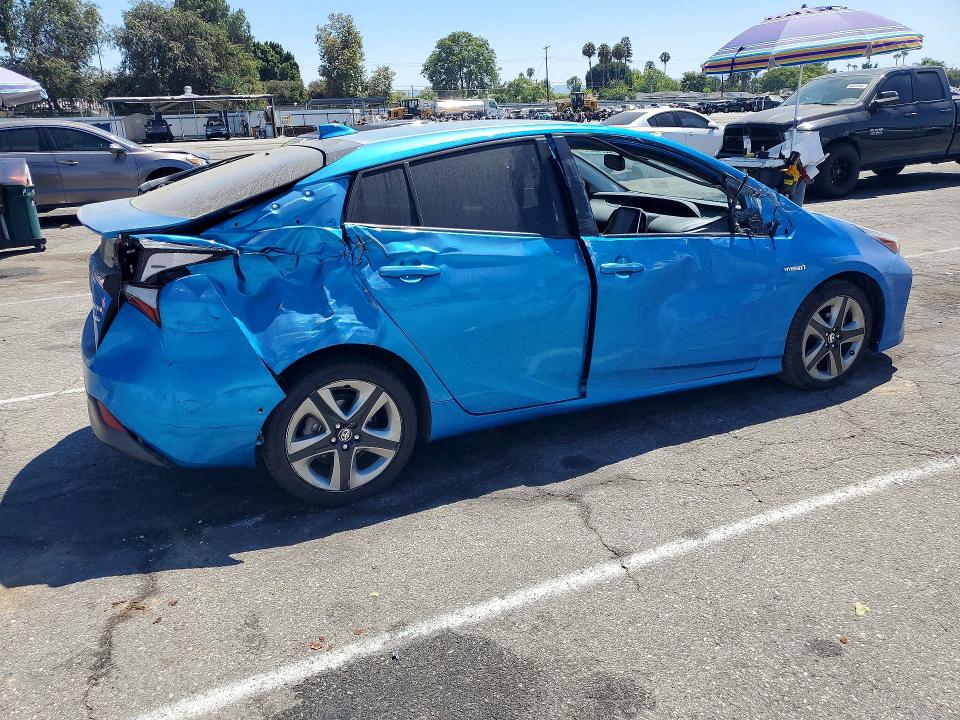 Photo 3 from auction – 2021 TOYOTA PRIUS with VIN JTDKAMFU7M3133706