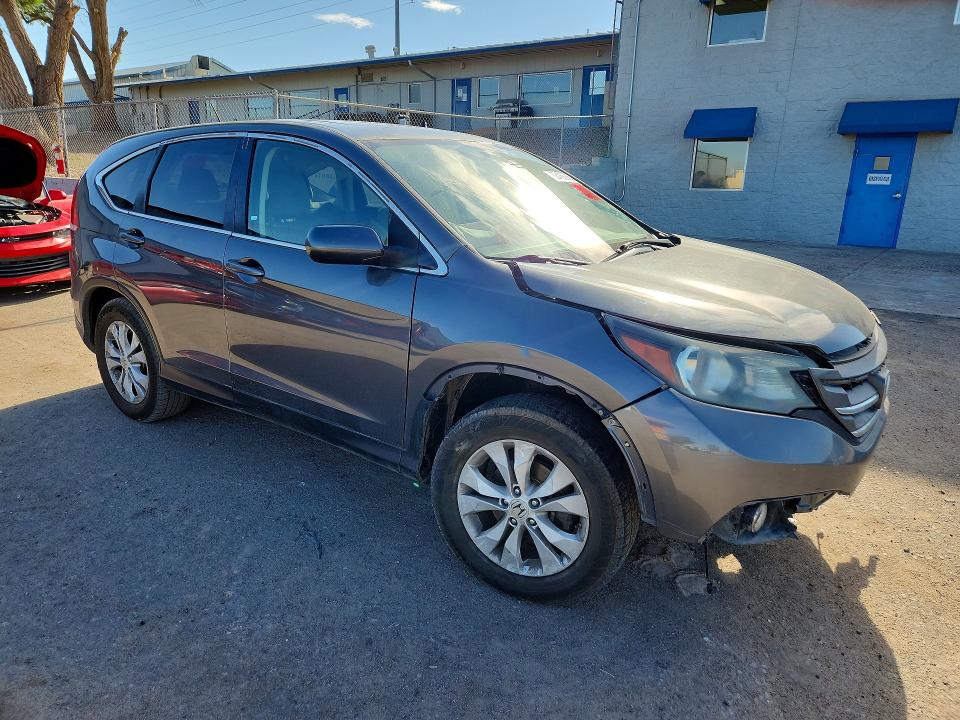 Photo 4 from auction – 2013 HONDA CR-V with VIN 2HKRM4H59DH671999