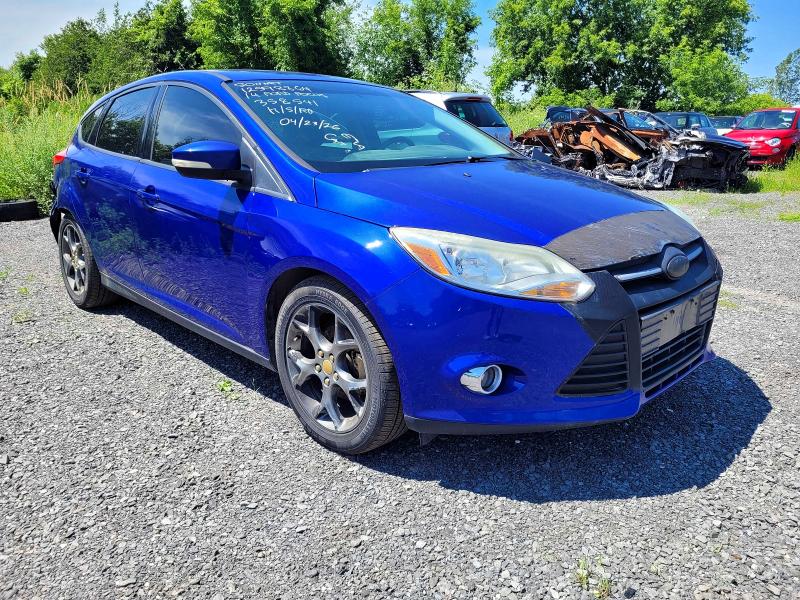 FORD FOCUS 2014 with VIN 1FADP3K21EL358541 - Photo from auction