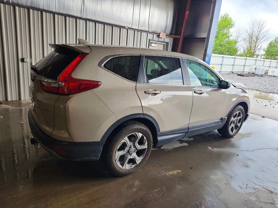 Photo 3 from auction – 2017 HONDA CR-V with VIN 5J6RW2H80HL077628