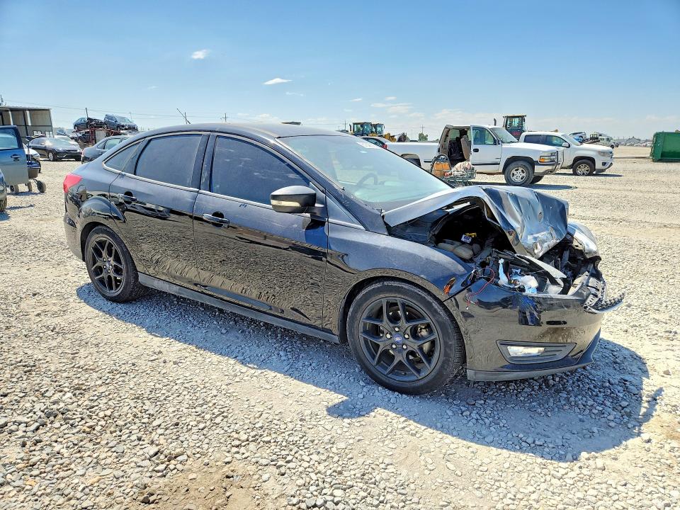 Photo 4 from auction – 2016 FORD FOCUS with VIN 1FADP3F20GL395190