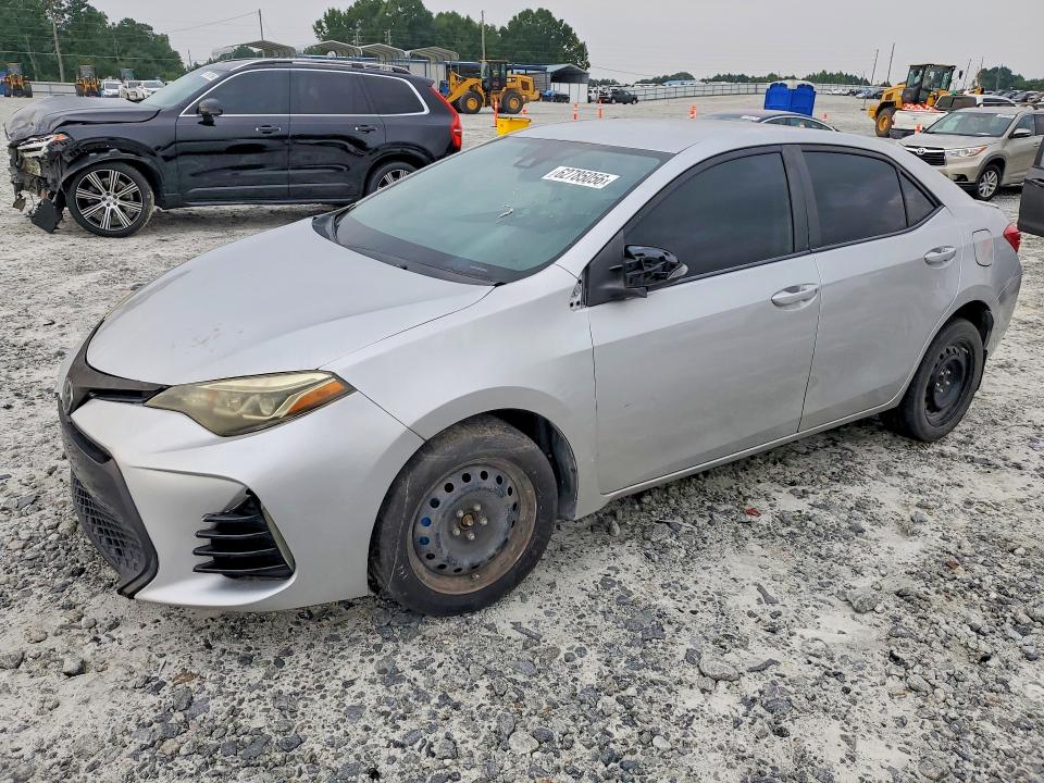 TOYOTA COROLLA 2019 with VIN 5YFBURHE4KP885104 - Photo from auction