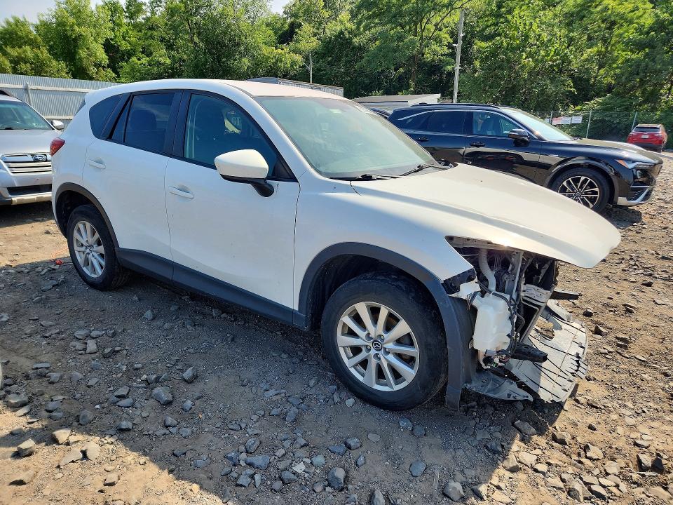 Photo 4 from auction – 2014 MAZDA CX-5 with VIN JM3KE4CY8E0392971