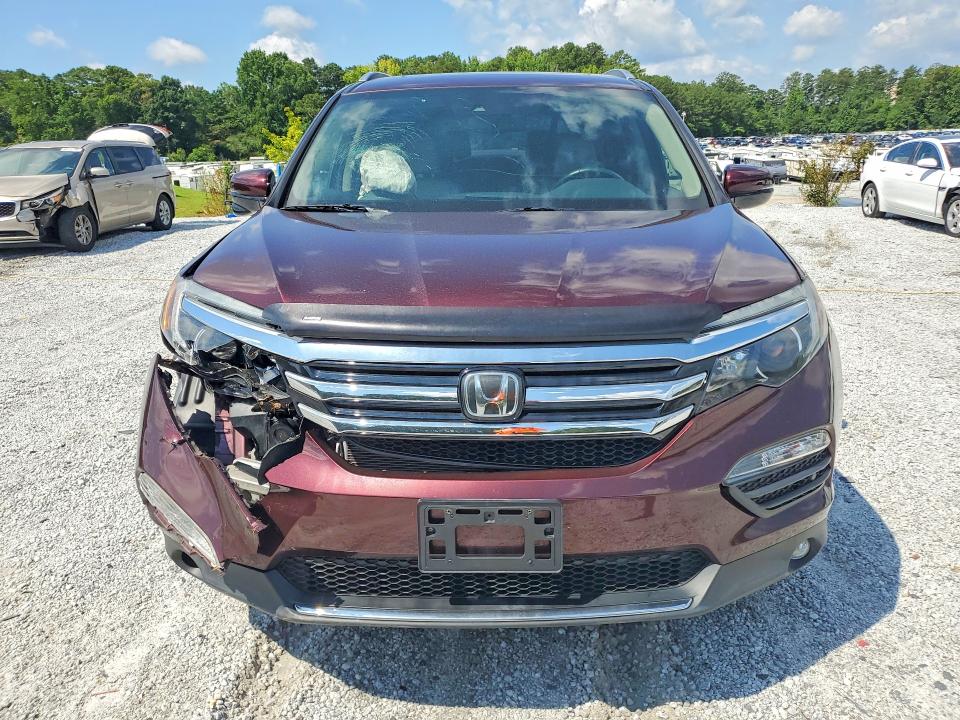 Photo 5 from auction – 2017 HONDA PILOT with VIN 5FNYF6H94HB042062