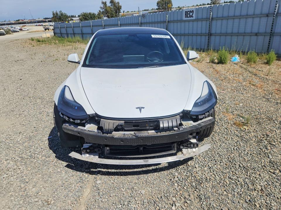 Photo 5 from auction – 2022 TESLA MODEL 3 with VIN 5YJ3E1EAXNF127787