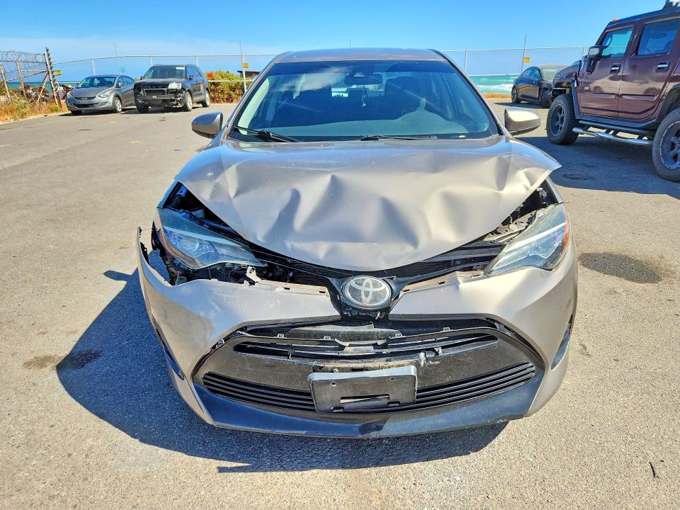 Photo 5 from auction – 2018 TOYOTA COROLLA with VIN 5YFBURHE7JP771645