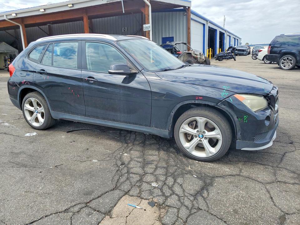 Photo 4 from auction – 2015 BMW X1 with VIN WBAVM5C58FVV93629