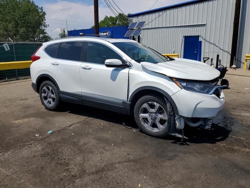Photo 4 from auction – 2019 HONDA CR-V with VIN 7FARW2H84KE057029