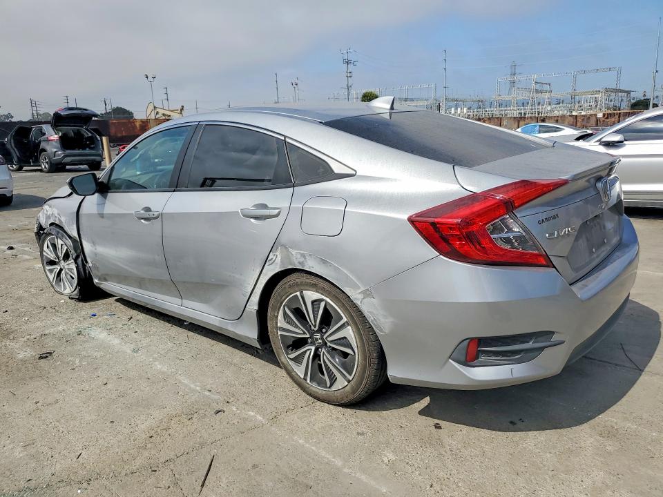 Photo 2 from auction – 2016 HONDA CIVIC with VIN 2HGFC1F71GH641953