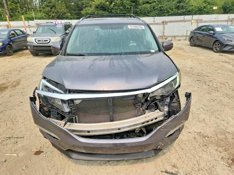 Photo 5 from auction – 2016 HONDA PILOT with VIN 5FNYF6H70GB126375
