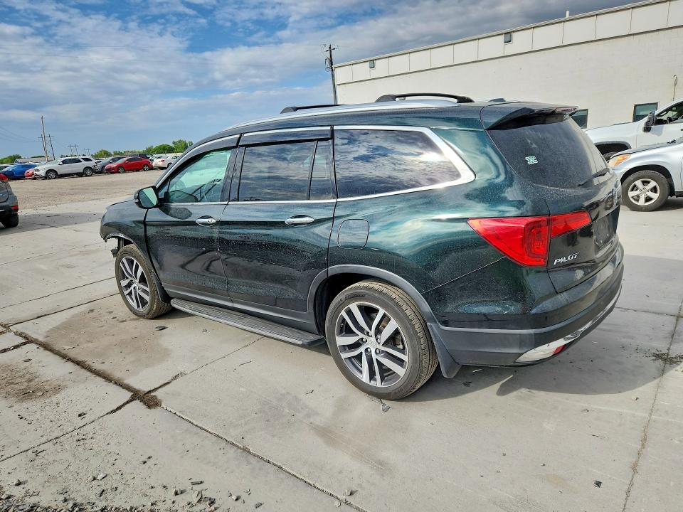 Photo 2 from auction – 2016 HONDA PILOT with VIN 5FNYF6H01GB066674