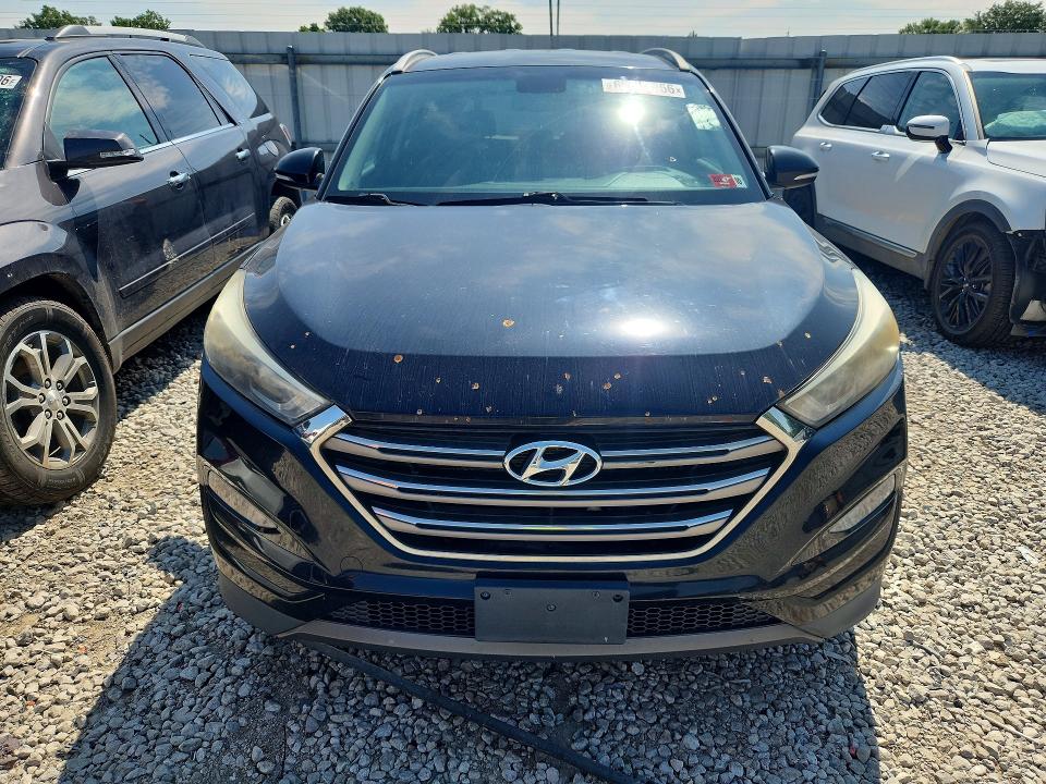 Photo 5 from auction – 2016 HYUNDAI TUCSON with VIN KM8J3CA24GU145960