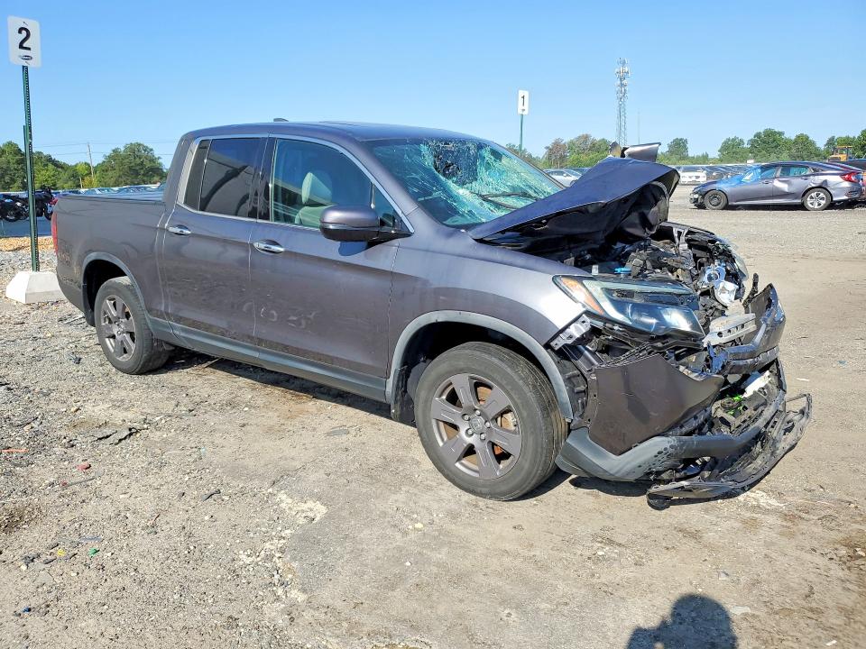 Photo 4 from auction – 2020 HONDA RIDGELINE with VIN 5FPYK3F71LB001397