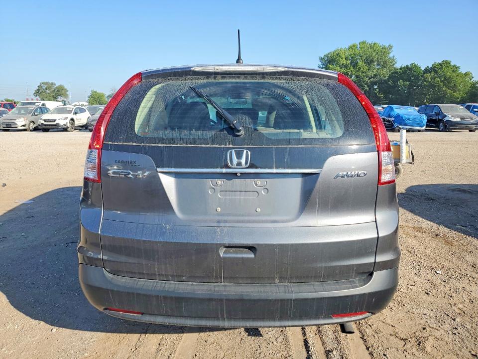 Photo 6 from auction – 2014 HONDA CR-V with VIN 2HKRM4H38EH693606