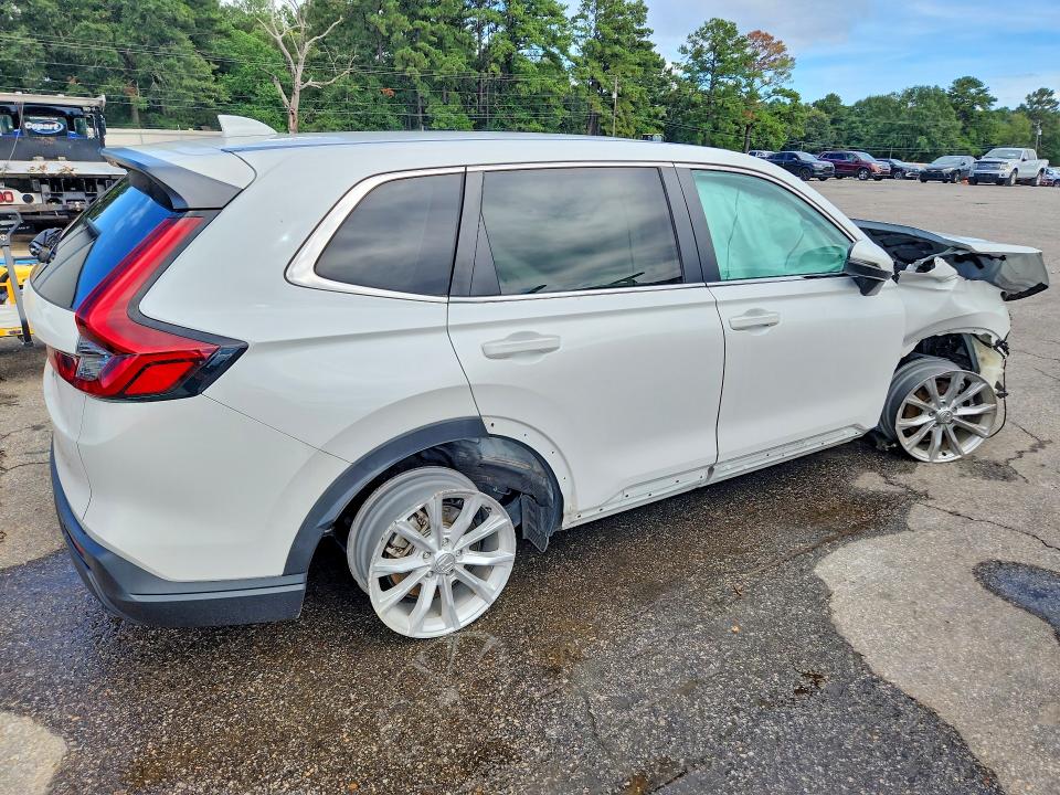 Photo 3 from auction – 2023 HONDA CR-V with VIN 2HKRS3H78PH300693