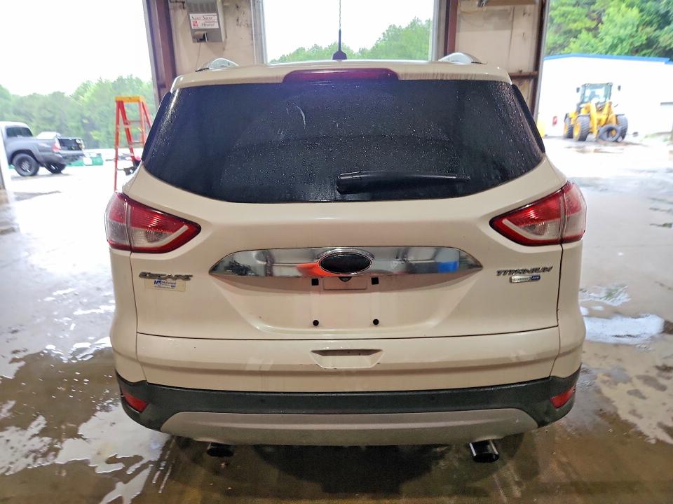 Photo 6 from auction – 2014 FORD ESCAPE with VIN 1FMCU9JX2EUD40943