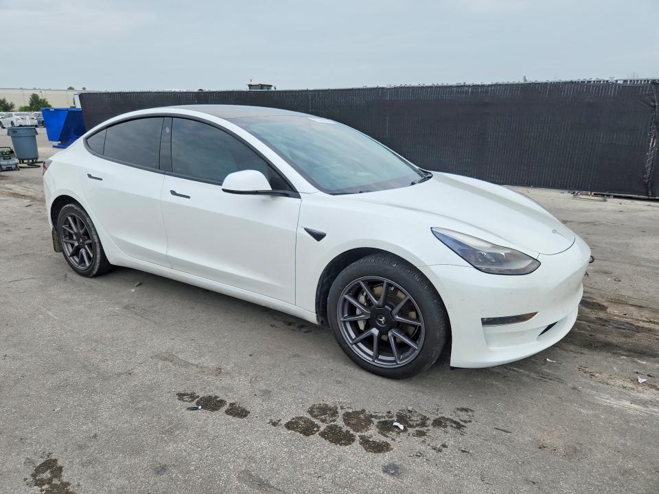 Photo 4 from auction – 2022 TESLA MODEL 3 with VIN 5YJ3E1EB3NF272968