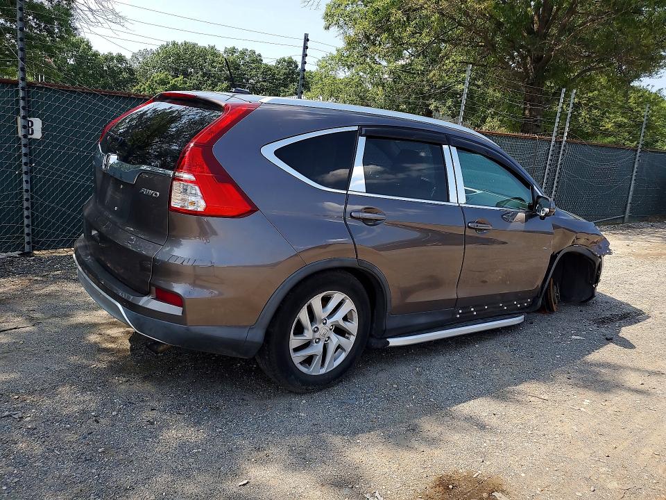 Photo 3 from auction – 2015 HONDA CR-V with VIN 2HKRM4H78FH614889