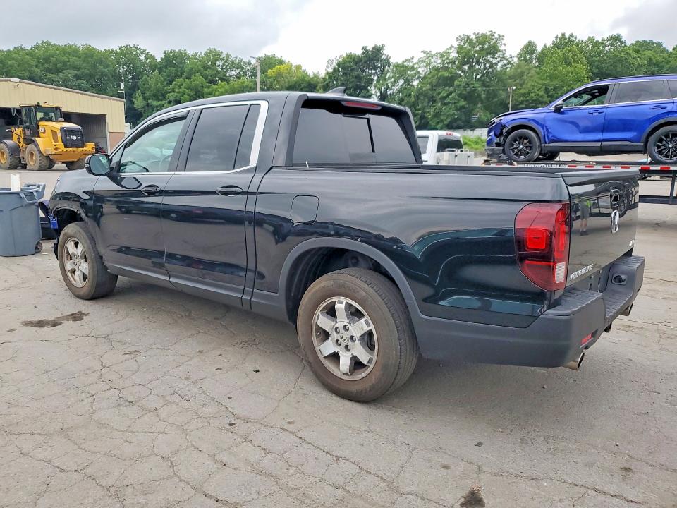 Photo 2 from auction – 2023 HONDA RIDGELINE with VIN 5FPYK3F52PB026393