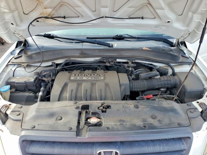 Photo 12 from auction – 2005 HONDA PILOT with VIN 2HKYF18625H541917