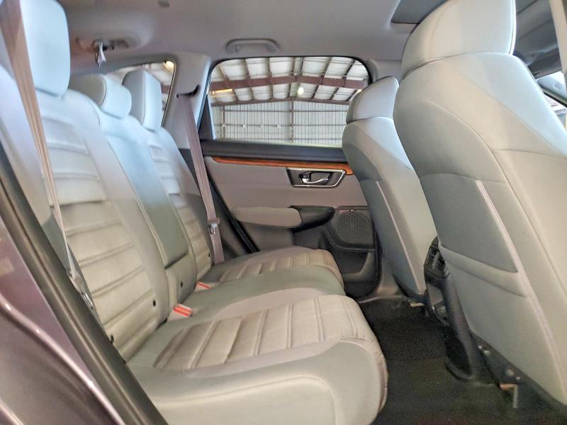 Photo 11 from auction – 2018 HONDA CR-V with VIN 7FARW1H56JE034334