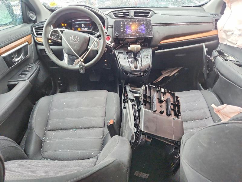 Photo 8 from auction – 2018 HONDA CR-V with VIN 7FARW2H58JE071164