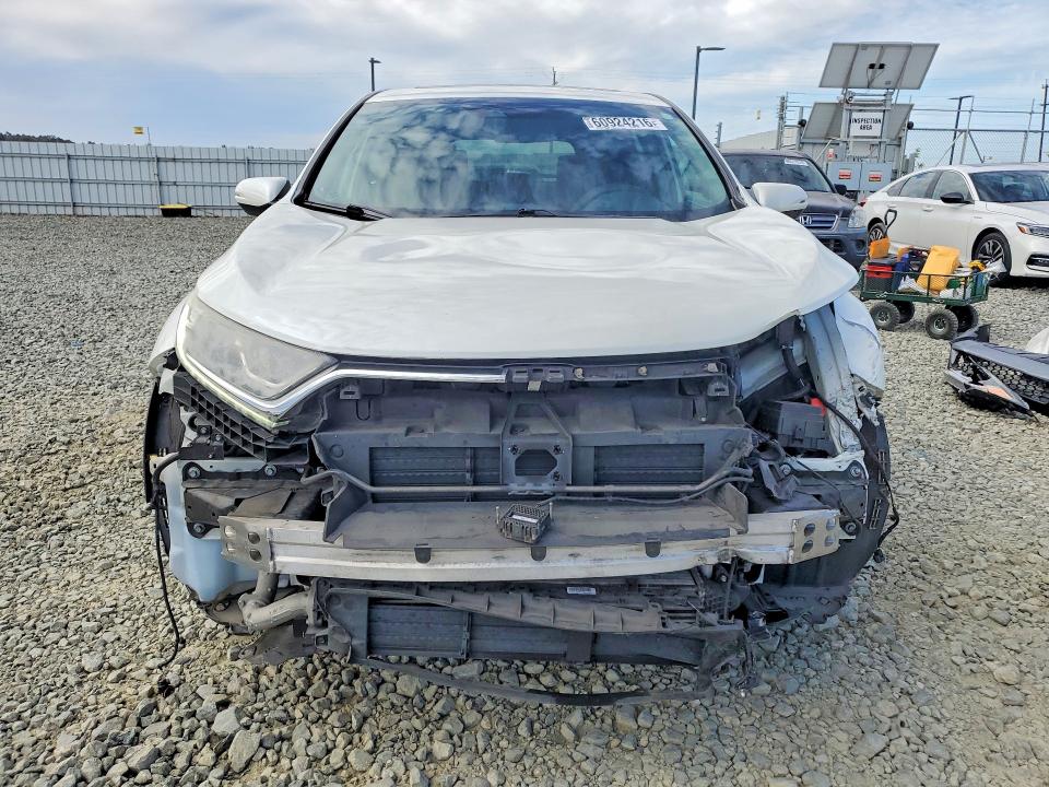 Photo 5 from auction – 2018 HONDA CR-V with VIN 2HKRW2H56JH694750