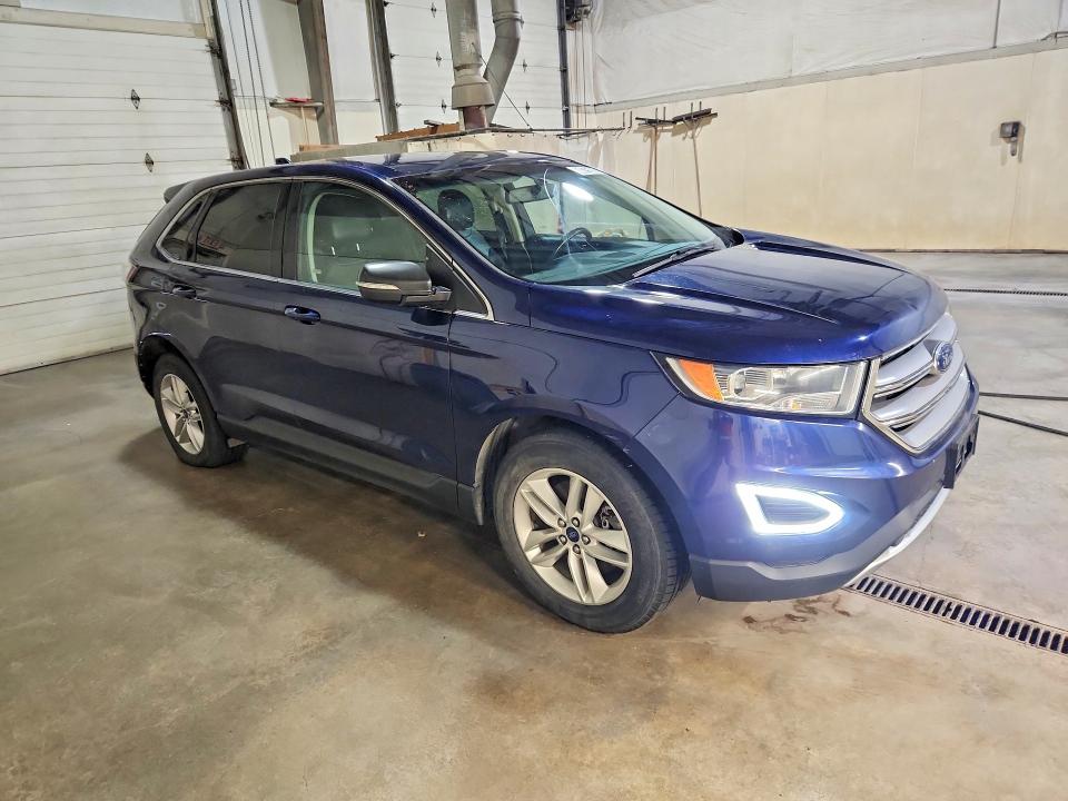 Photo 4 from auction – 2016 FORD EDGE with VIN 2FMPK4J95GBB89486