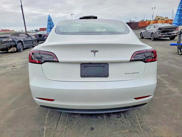 Снимка 6 от търг – 2023 TESLA MODEL 3 с VIN 5YJ3E1EB3PF477290