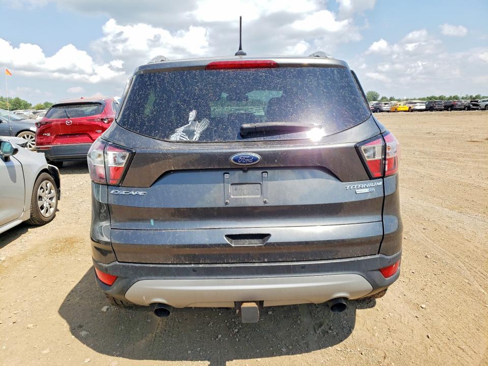 Photo 6 from auction – 2018 FORD ESCAPE with VIN 1FMCU9J9XJUA80593