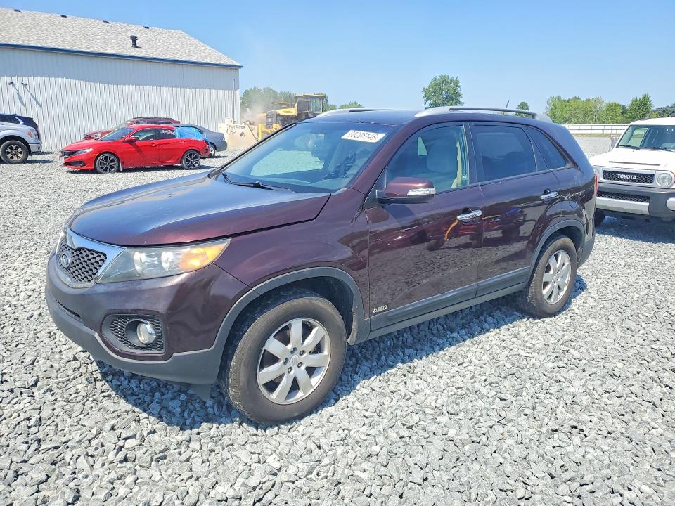 KIA SORENTO 2011 with VIN 5XYKTCA17BG132825 - Photo from auction