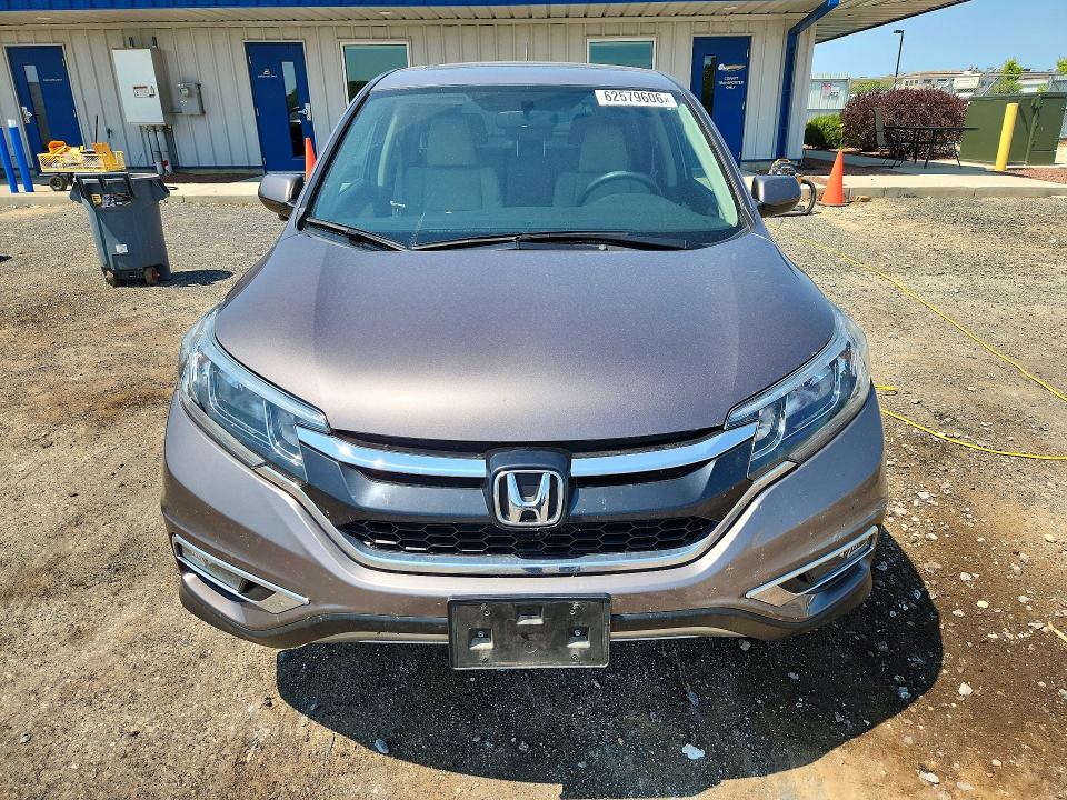 Photo 5 from auction – 2015 HONDA CR-V with VIN 5J6RM4H54FL071867
