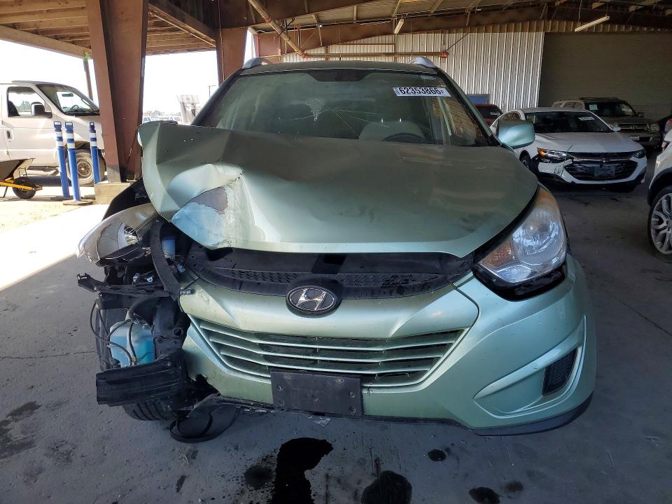 Photo 5 from auction – 2011 HYUNDAI TUCSON with VIN KM8JUCAC7BU229690