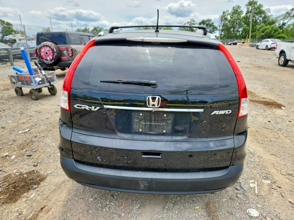 Photo 6 from auction – 2014 HONDA CR-V with VIN 5J6RM4H56EL071044