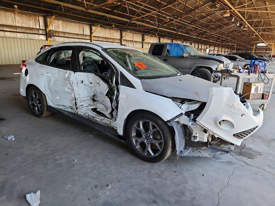 Photo 4 from auction – 2013 FORD FOCUS with VIN 1FADP3F27DL363297