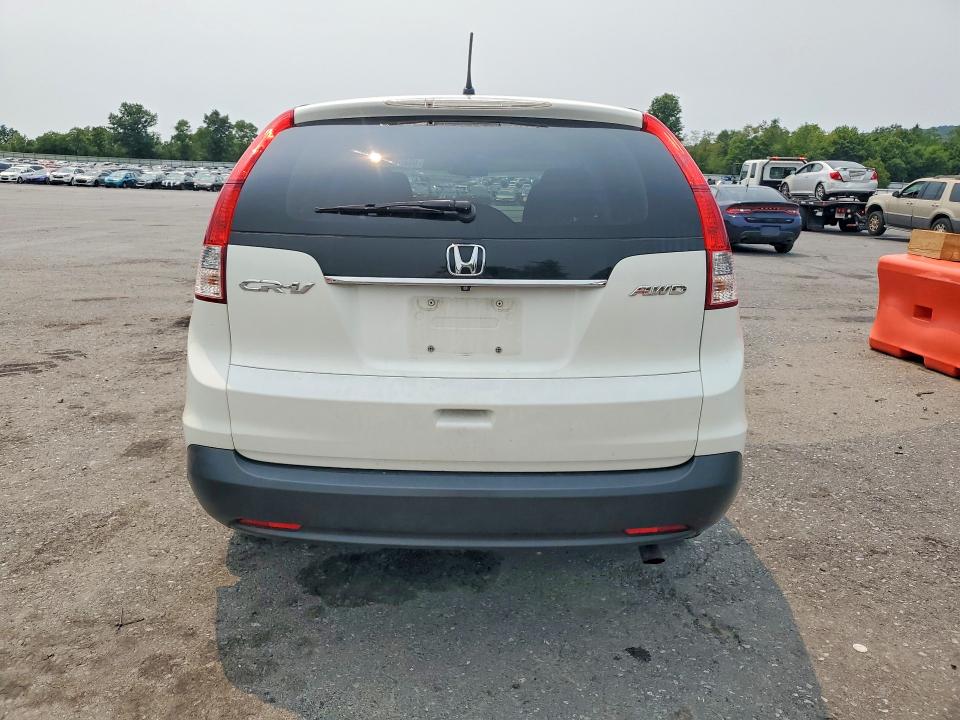 Photo 6 from auction – 2014 HONDA CR-V with VIN 5J6RM4H52EL076841