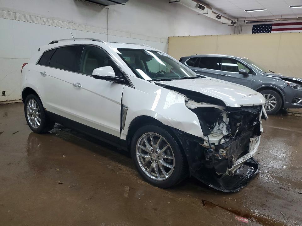 Photo 4 from auction – 2014 CADILLAC SRX with VIN 3GYFNFE32ES658043