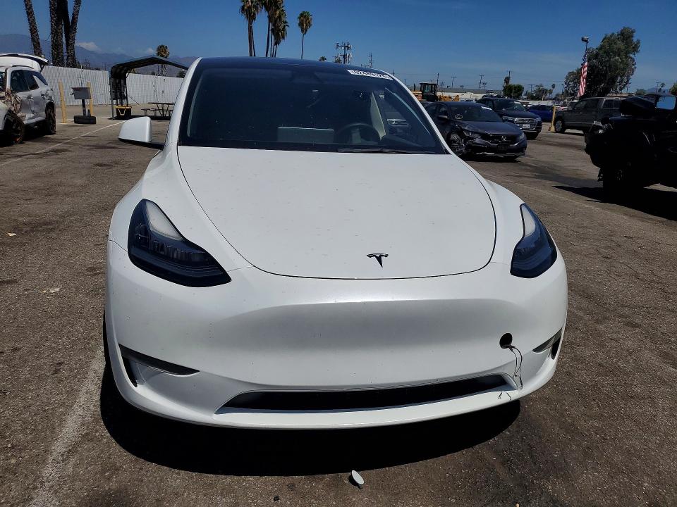 Photo 5 from auction – 2023 TESLA MODEL Y with VIN 7SAYGDEE9PA136343