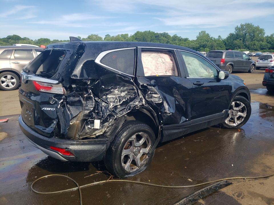 Photo 3 from auction – 2018 HONDA CR-V with VIN 7FARW2H5XJE039204