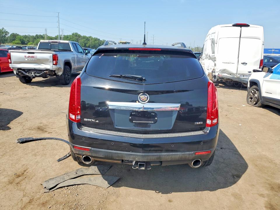 Photo 6 from auction – 2014 CADILLAC SRX with VIN 3GYFNGE35ES518512