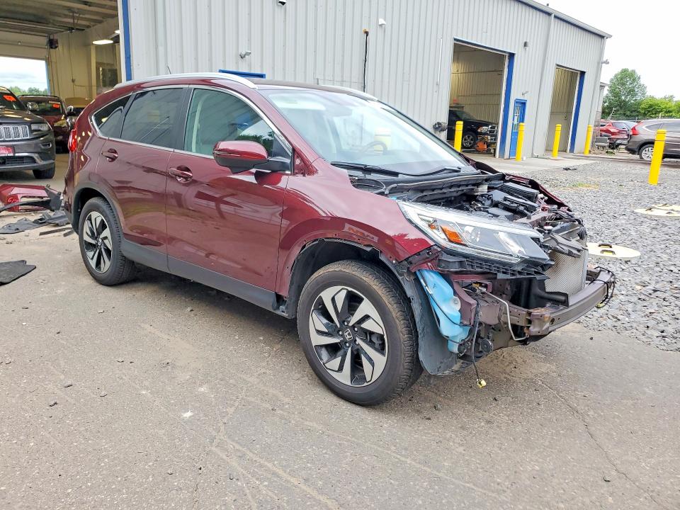 Photo 4 from auction – 2016 HONDA CR-V with VIN 5J6RM4H98GL106110