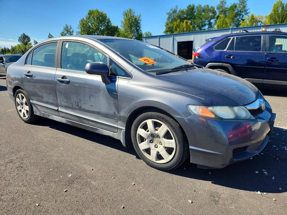 Photo 4 from auction – 2011 HONDA CIVIC with VIN 19XFA1F58BE021348