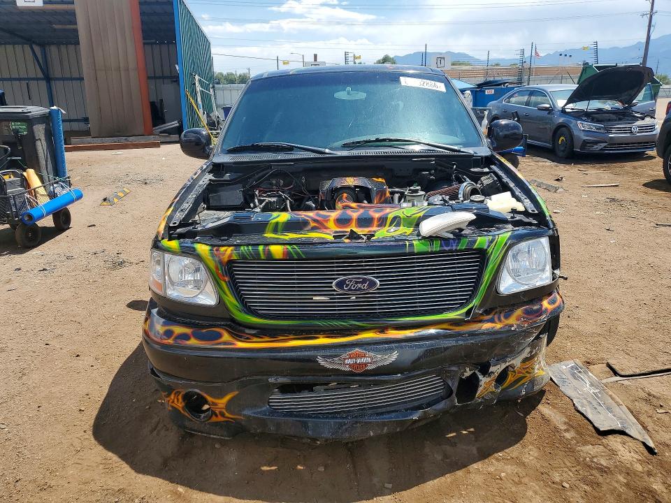 Photo 5 from auction – 2000 FORD F150 with VIN 2FTRX07L2YCB10541