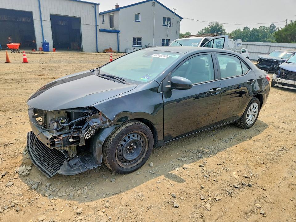 TOYOTA COROLLA 2017 with VIN 5YFBURHE3HP613295 - Photo from auction