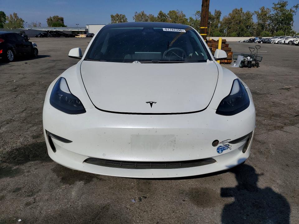 Photo 5 from auction – 2021 TESLA MODEL 3 with VIN 5YJ3E1EB2MF877465