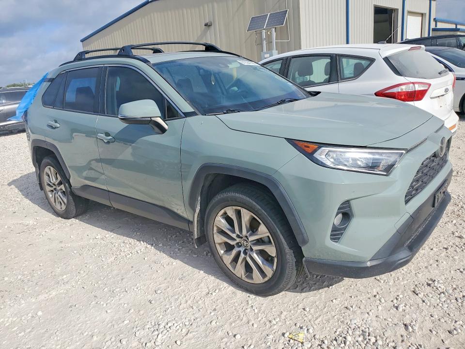 Photo 4 from auction – 2021 TOYOTA RAV4 with VIN JTMC1RFV2MD074181